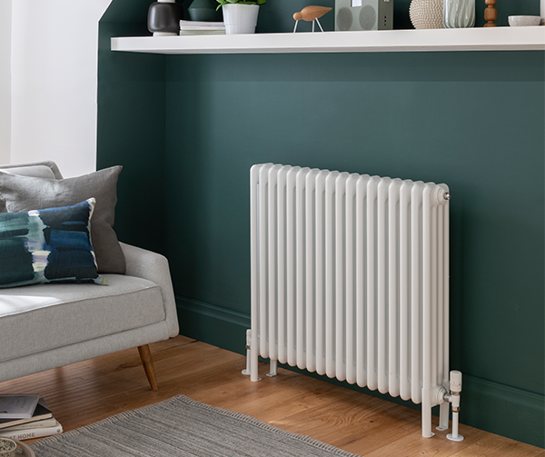 White radiator on blue wall